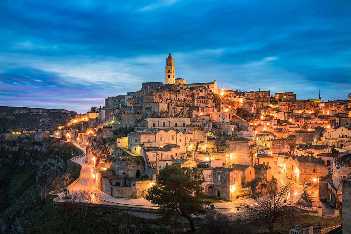 The city of Matera, photographed at dusk.